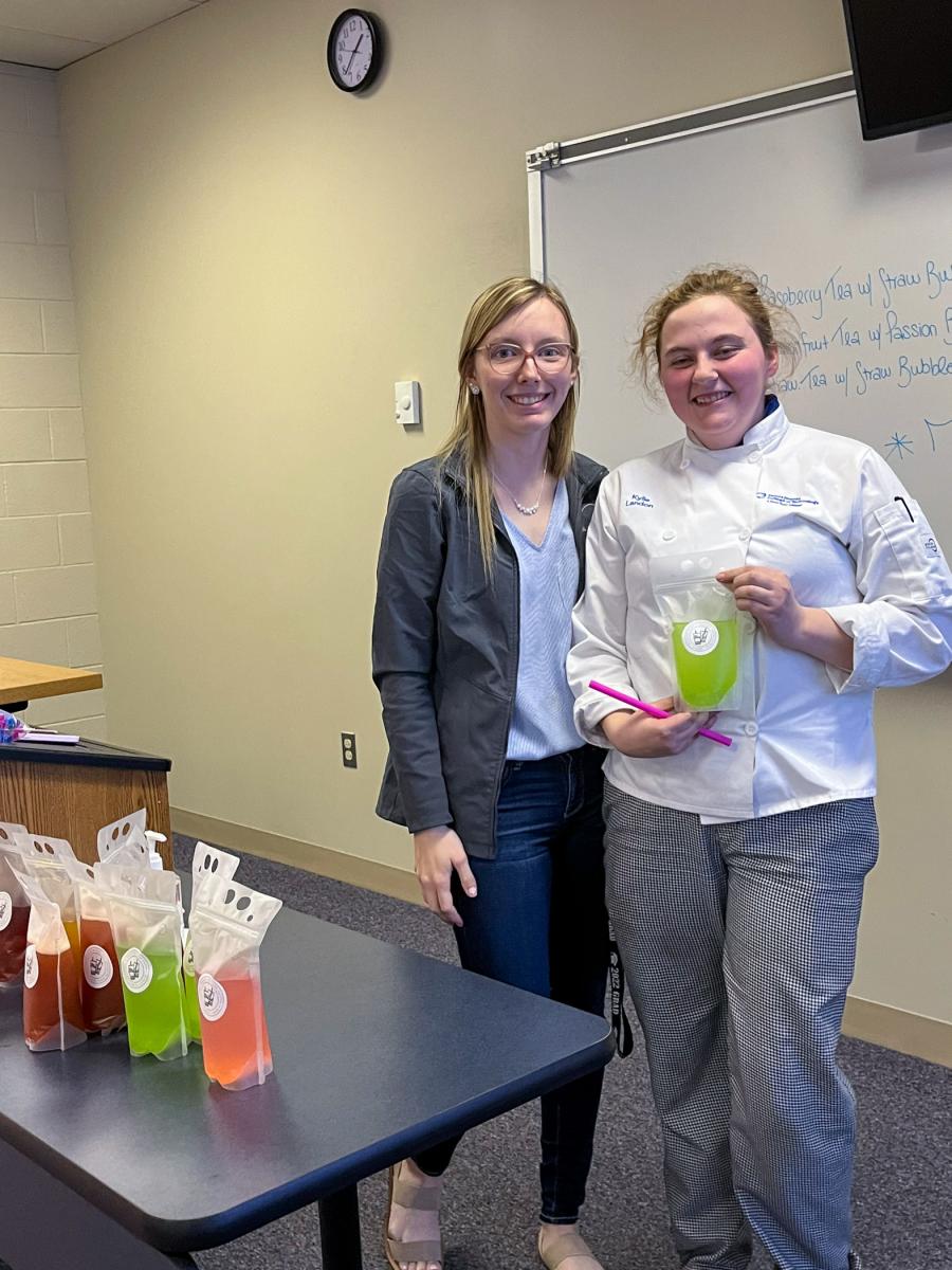 Kenyon (left) with fellow Canton-area native Kylie R. Landon, a culinary arts technology student.