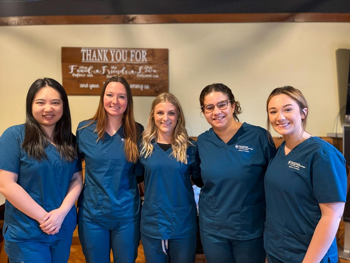 Visiting the American Rescue Workers facility are (from left) Lixuan Pan, of Williamsport; Delaney M. Doan, of Knoxville; Hope Ragan, of Jersey Shore; Maria Curiel, of Williamsport; and Amanda M. Crilley, of Williamsport.