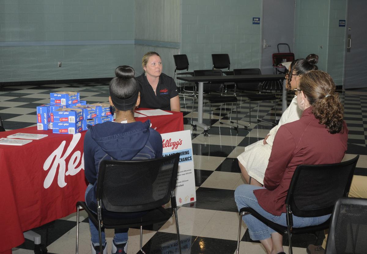 Displaying a very familiar logo, as well as samples of one of Kellogg's most popular brands, Julie Smith talks with students about opportunities at the company's Muncy plant. Among the world's leading producers of cereal and convenience foods, Kellogg's is another of Penn College's Corporate Tomorrow Makers.