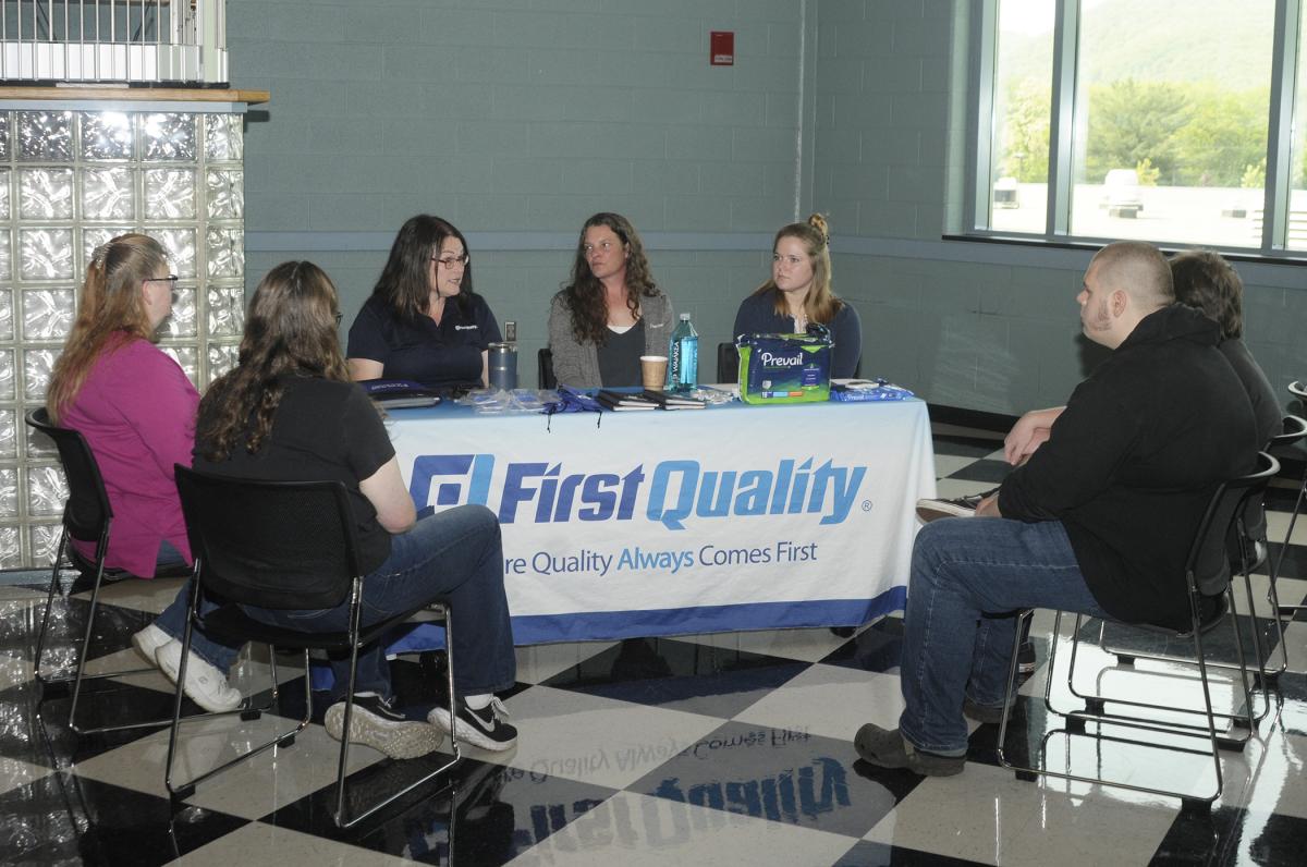 One of the first to embrace Workforce Development's apprenticeship and pre-apprenticeship programs is First Quality, a leader in personal health care products and a longtime corporate partner of Penn College, with two locations in Clinton County among its worldwide reach. Meeting with students in a round-robin rotation are (from left) Karen Wertz, Renee Yarborough and Kendell Smith.