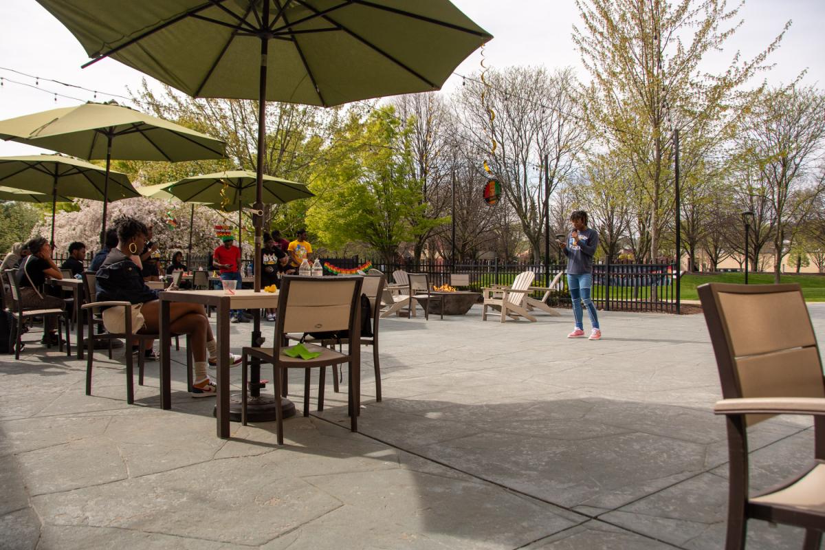 Love reads a second poem she authored, titled “Time.”