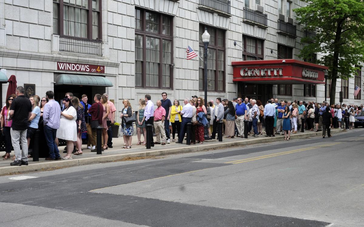 The Genetti's windows may be on Fourth, but the line of commencement attendees turned up William Street while waiting for the CAC doors to open for the weekend's final ceremony.