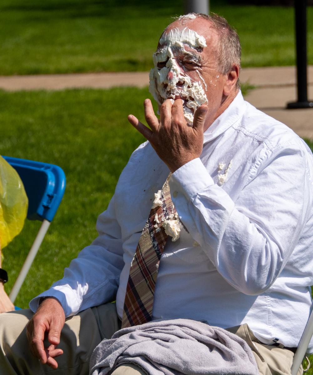 ... and laughingly pronounces his verdict: "It tastes good!"