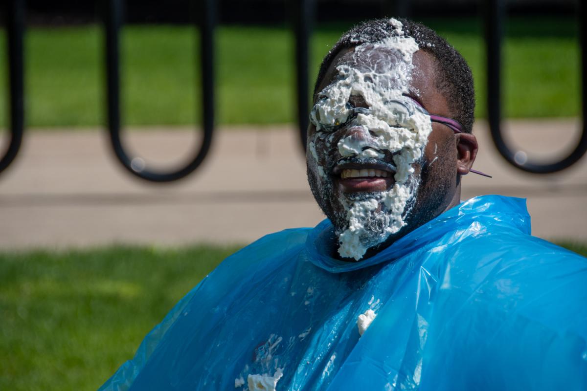 Somewhere under the whipped cream and goggles is Woods.