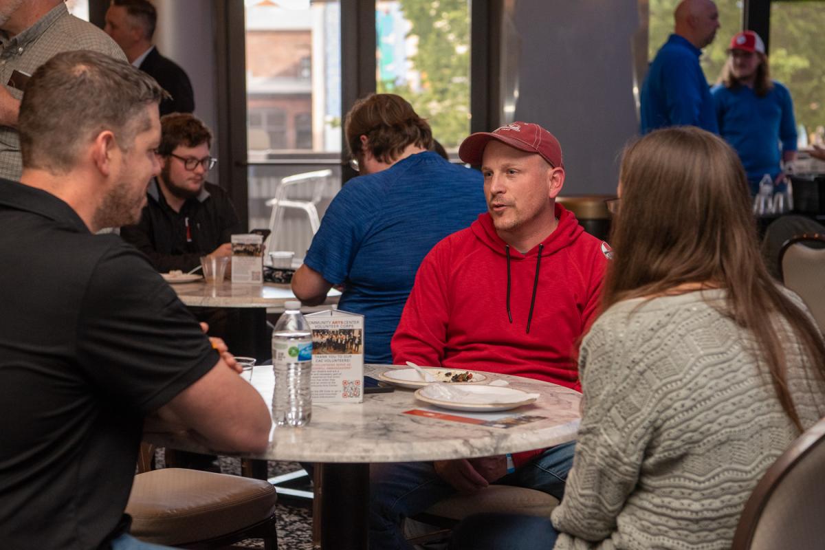 Dante M. Damanti (in red sweatshirt), an incoming brewing student, enjoys conversation with Justin M. Ingram (left), associate professor of biology, who recently opened the Penn College Brewing & Fermentation Research Lab at Bald Birds Brewing Co. in Jersey Shore.