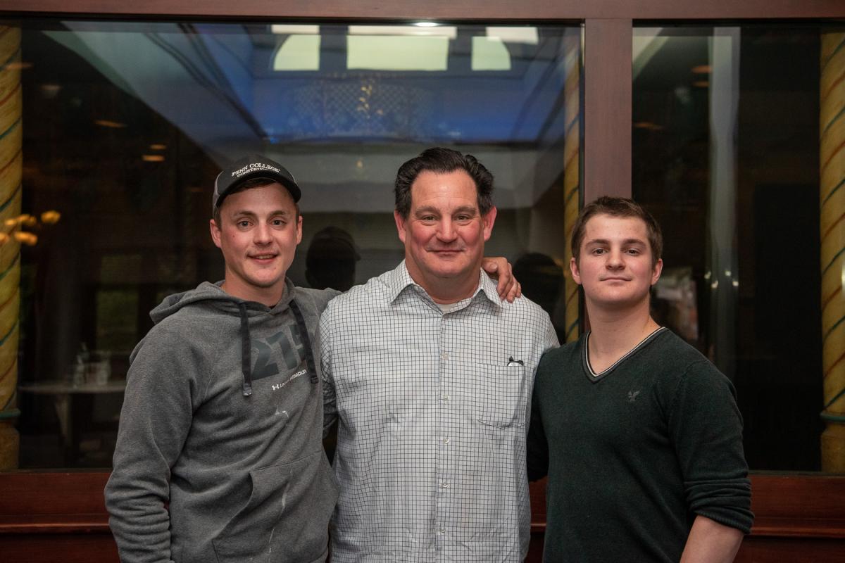 Druckenmiller (right) enjoys the evening with his father, Scott, and brother, Ty, ’19, building construction technology.