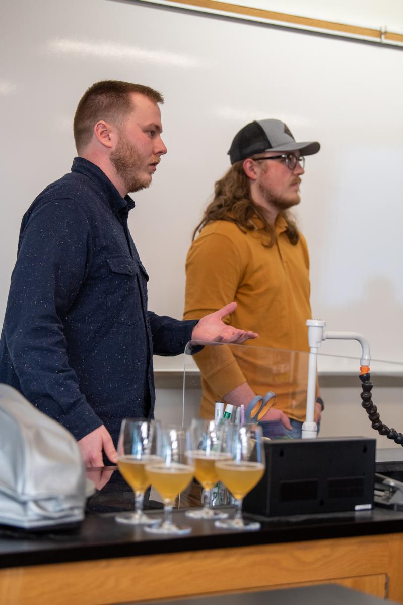 Ligon (left) and Walton discuss their bold brewing attempt with a historical Norwegian technique.