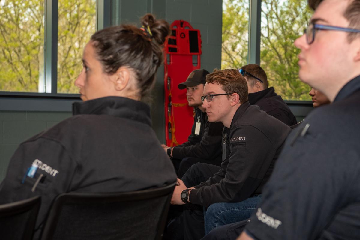 Students, including Cole N. Hillyer (center), of Renovo, listen intently to Bjorkman’s briefing. Hillyer was assigned the role of incident commander for the exercise. He is enrolled in the emergency management and paramedic majors. 