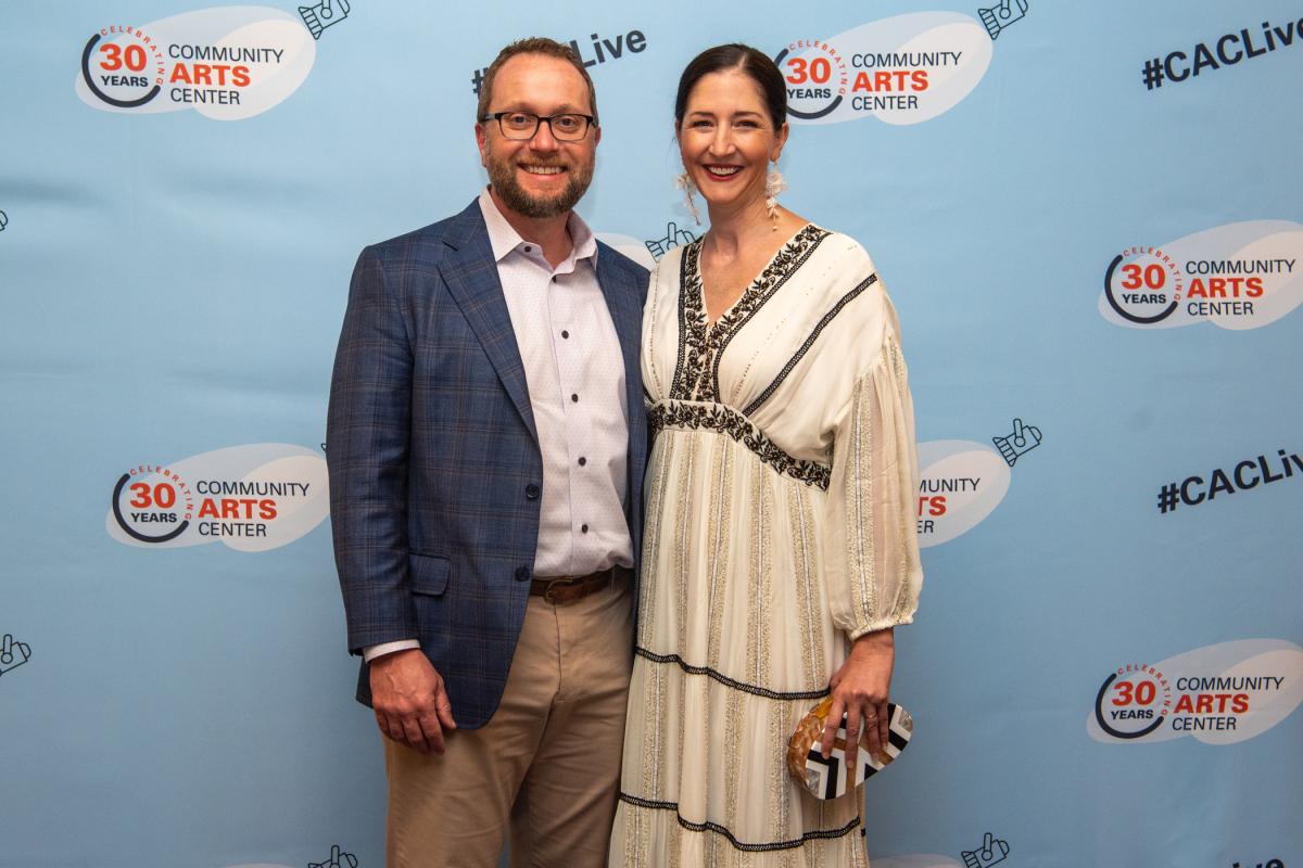 Master event sponsor Evergreen Wealth Solutions’ Andrew and Elizabeth Harris pause for a photograph on their way into the gathering.  