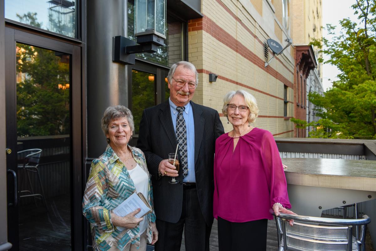 Martin is joined by Bonnie Powell (left) and Nancy Schick, two longtime arts center volunteers and retired college administrative support staff. 