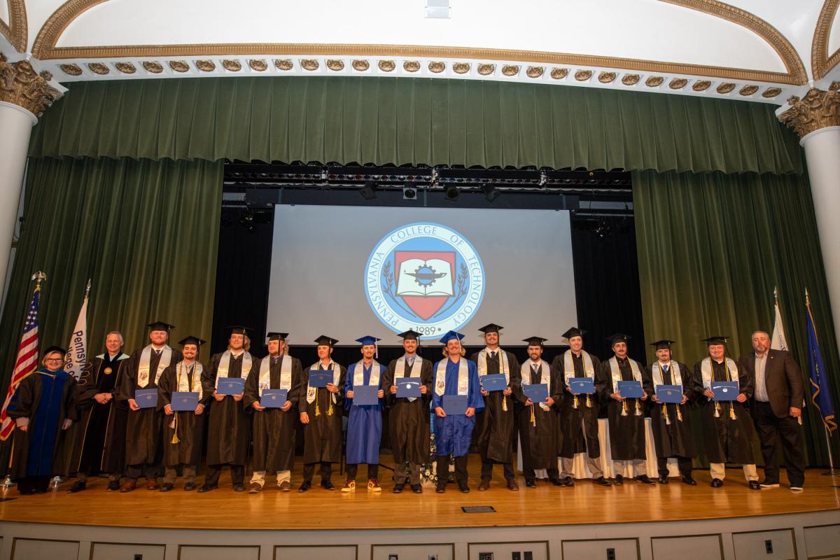 Alp, Reed and Howard (right) join a group shot ... 