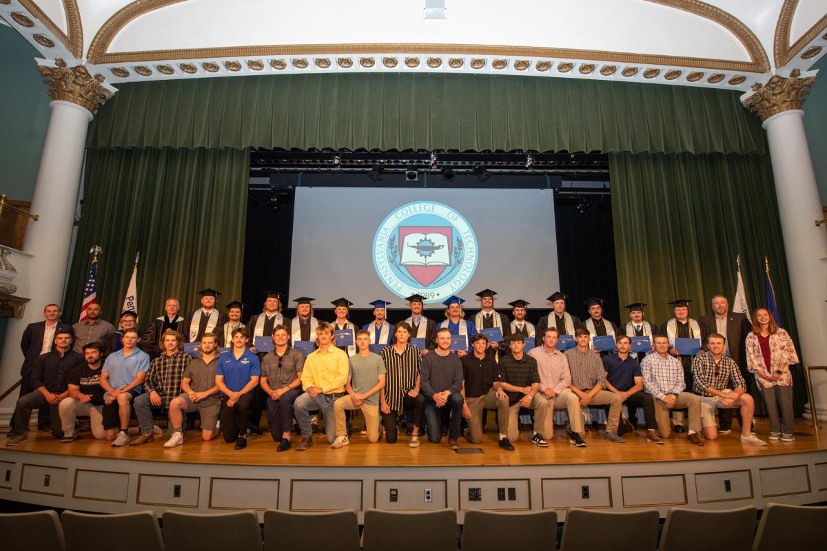 ... followed by more ballplayers and team assistants.