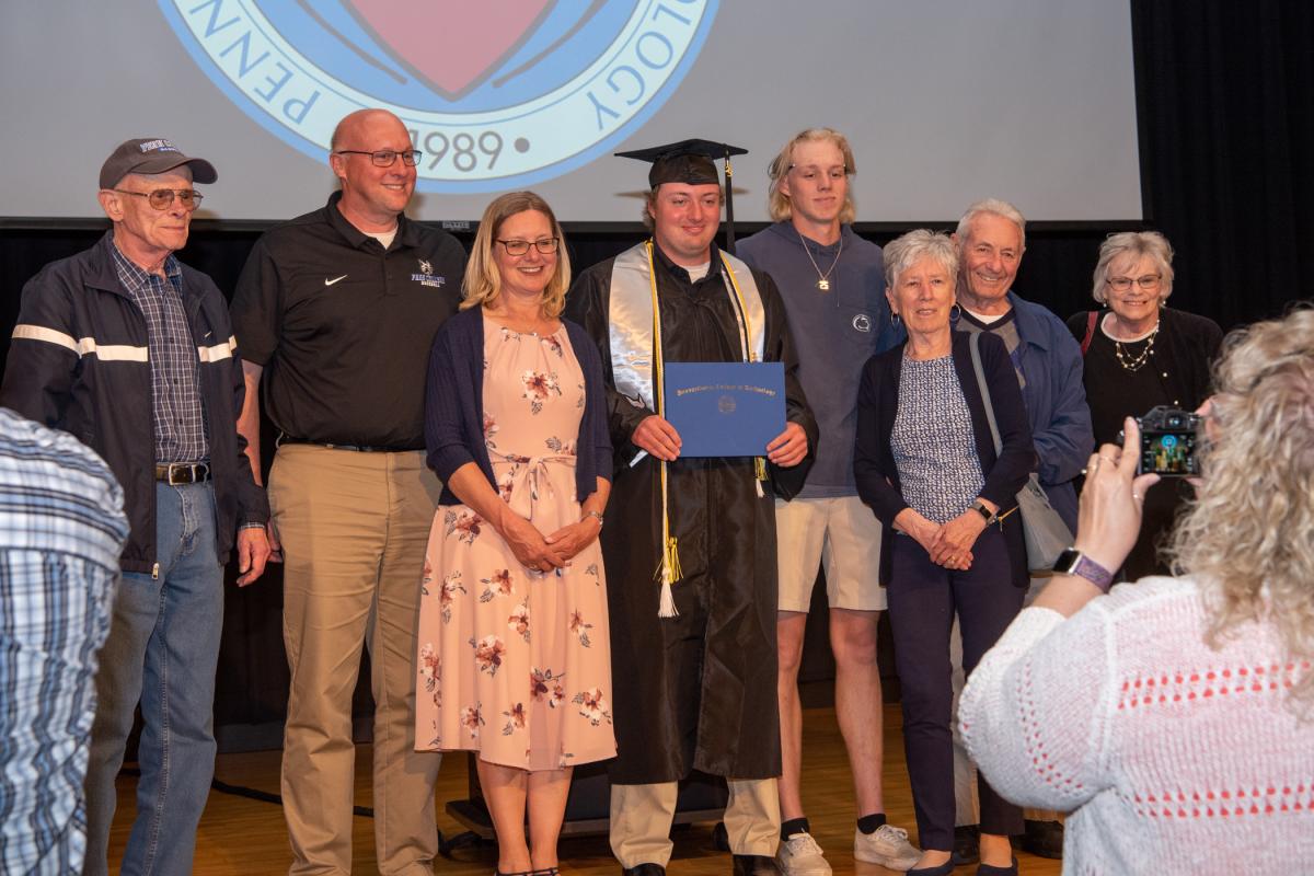 Among a flurry of commemorative photos at the front of the house, Andrew M. Snyder gathers with his whole family ... 