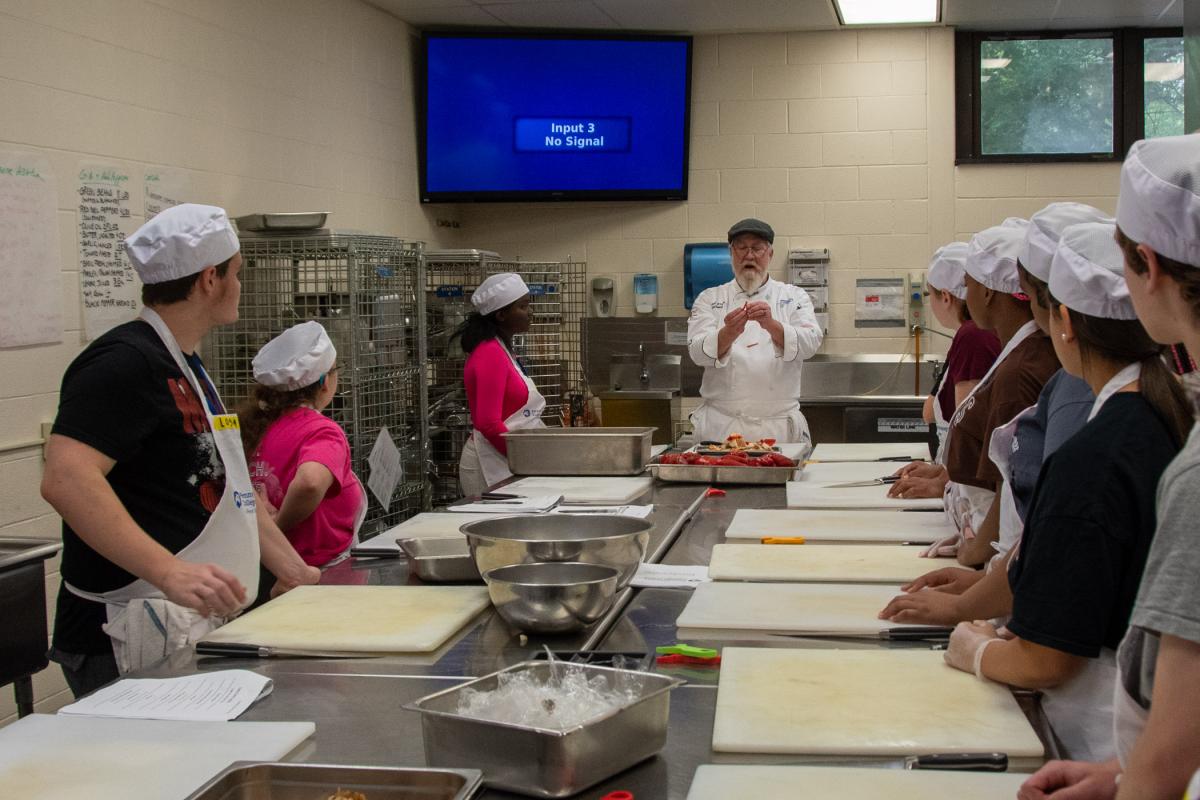 Chef Frank M. Suchwala, associate professor of hospitality management/culinary arts, demonstrates how to “julienne” a red bell pepper.