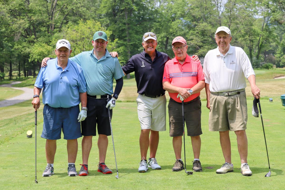 Funk (center) joins a foursome from Compass Group North America, the title sponsor.