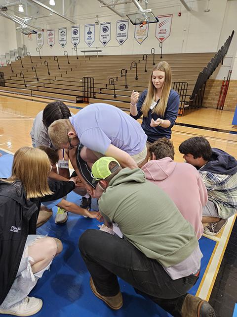 ... a network of mutual support that was emphasized in a team-building exercise overseen here by Albert.