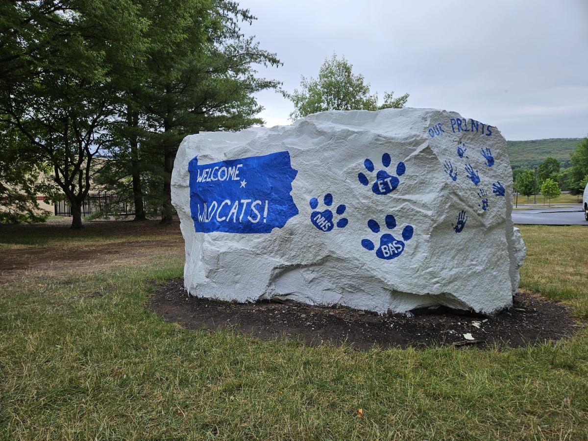 "The Rock," emblazoned with paw prints bearing the abbreviations of the college's three schools – Business, Arts & Sciences; Engineering Technologies; and Nursing & Health Sciences – welcomes a new pride of Wildcats.