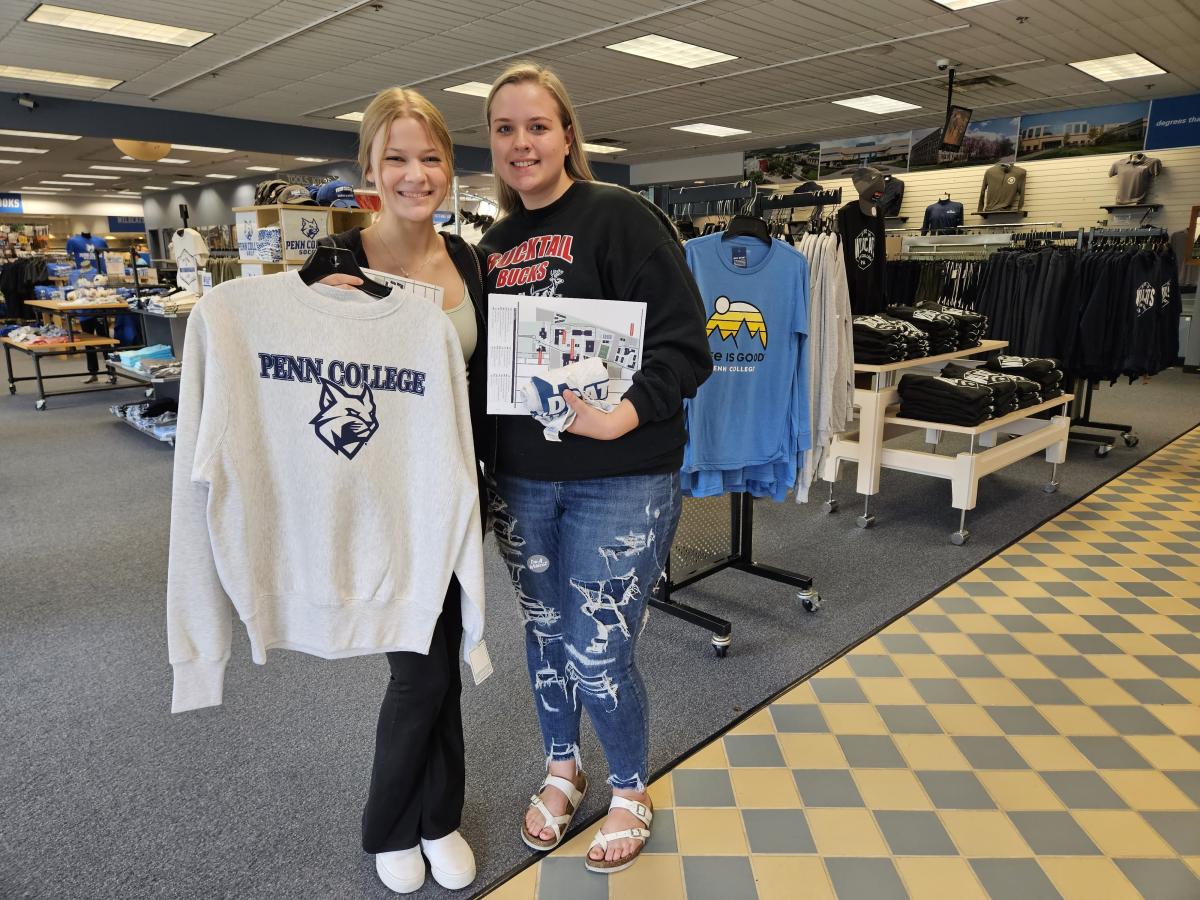 Pre-nursing students Kira K. Bierly (left), of Jersey Shore, and Kori A. Prebble, of North Bend, check out the inventory in The College Store ...