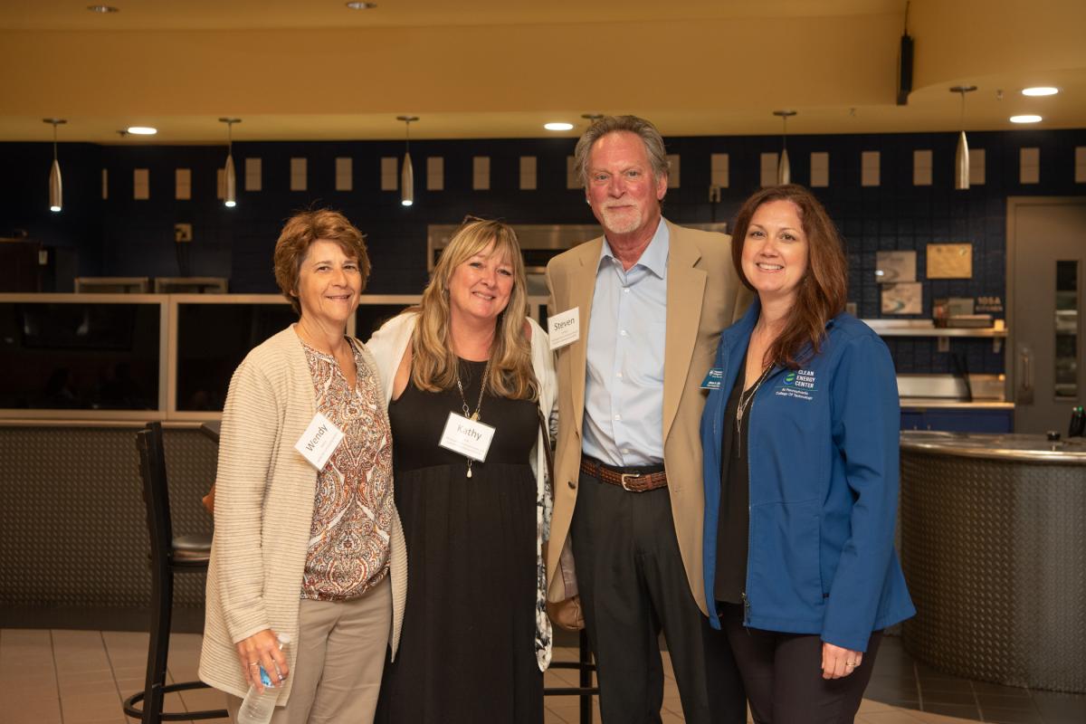 Alison A. Diehl (right), executive director of the college’s Clean Energy Center, enjoys networking with (from left) Center for Community Action’s Wendy Melius, and the state Department of Community and Economic Development’s Kathy Rulli and Steven Lambert. 