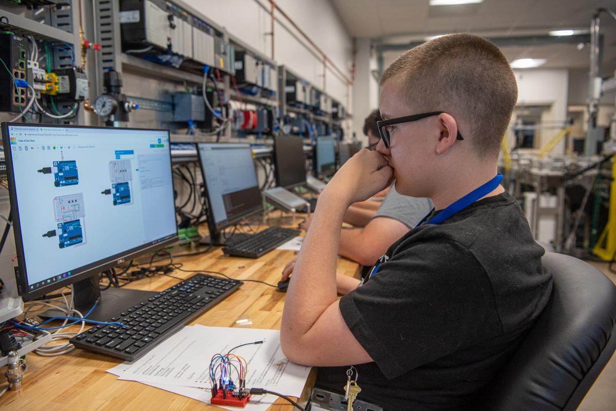 An electronics lab is among the many workshop locations explored by students in the Engineering Pre-College Program.