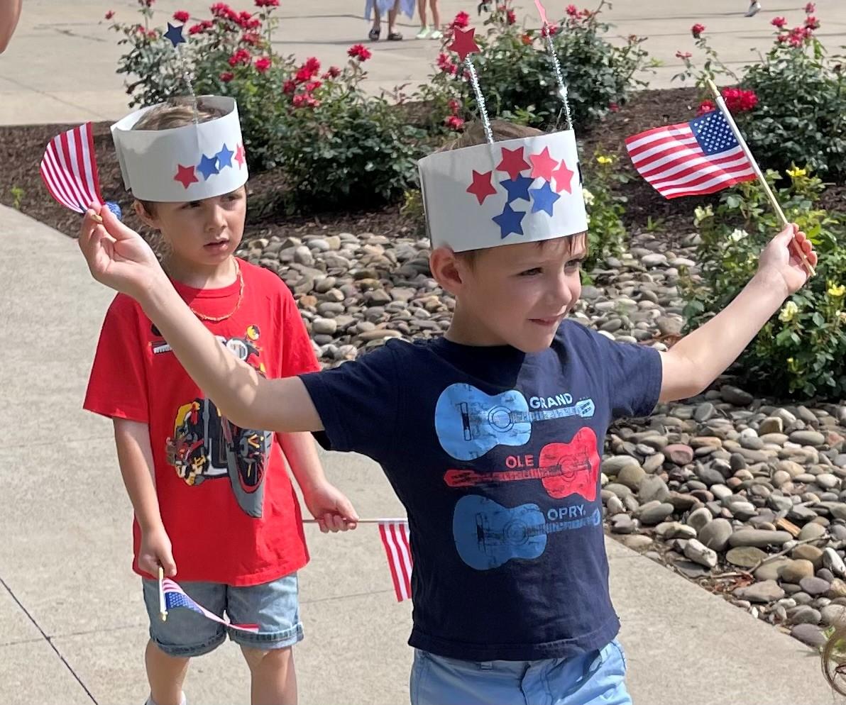 A two-fisted flag-bearer struts his stuff.