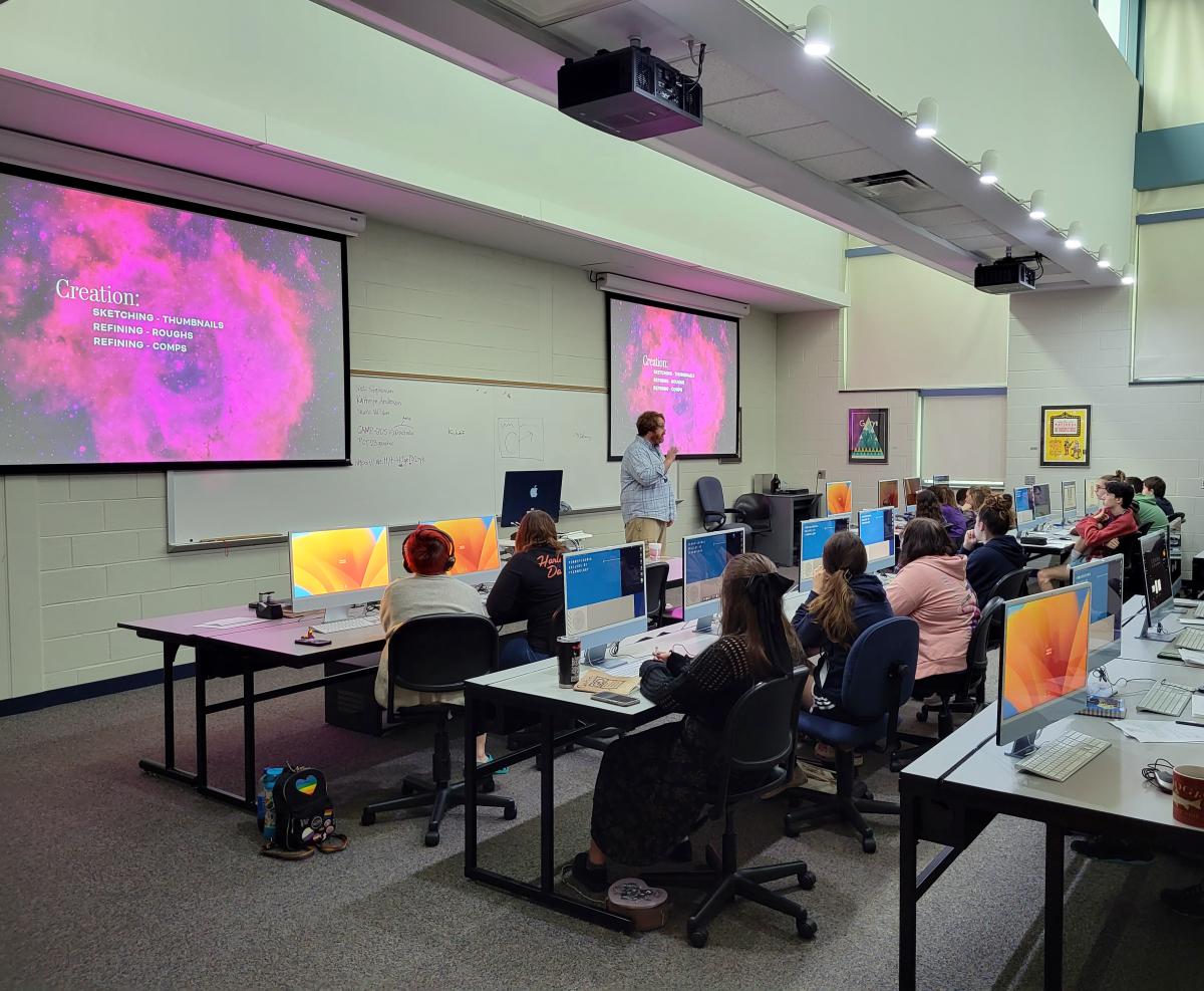 Nicholas L. Stephenson, among the graphic design faculty working with campers, outlines the processes practiced by professionals in the field: definition, creation, feedback and delivery.