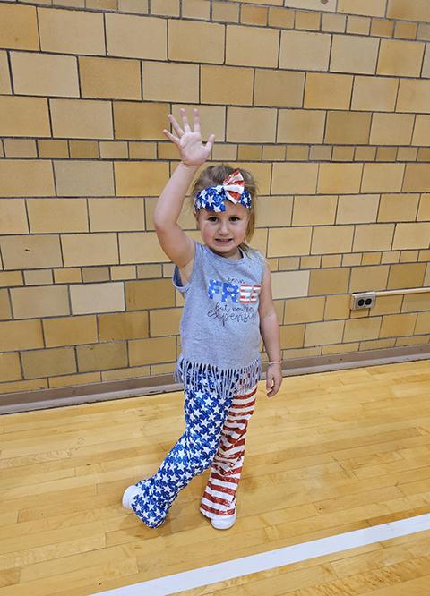 The star-spangled banner yet waves, as does this decked-out cutie!