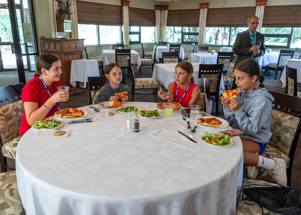 ... though no such assistance is needed for the "eating" portion of the enterprise. At right is Ron L. Ott Jr., coordinator of restaurant operations/maitre d'hotel at Le Jeune Chef Restaurant.