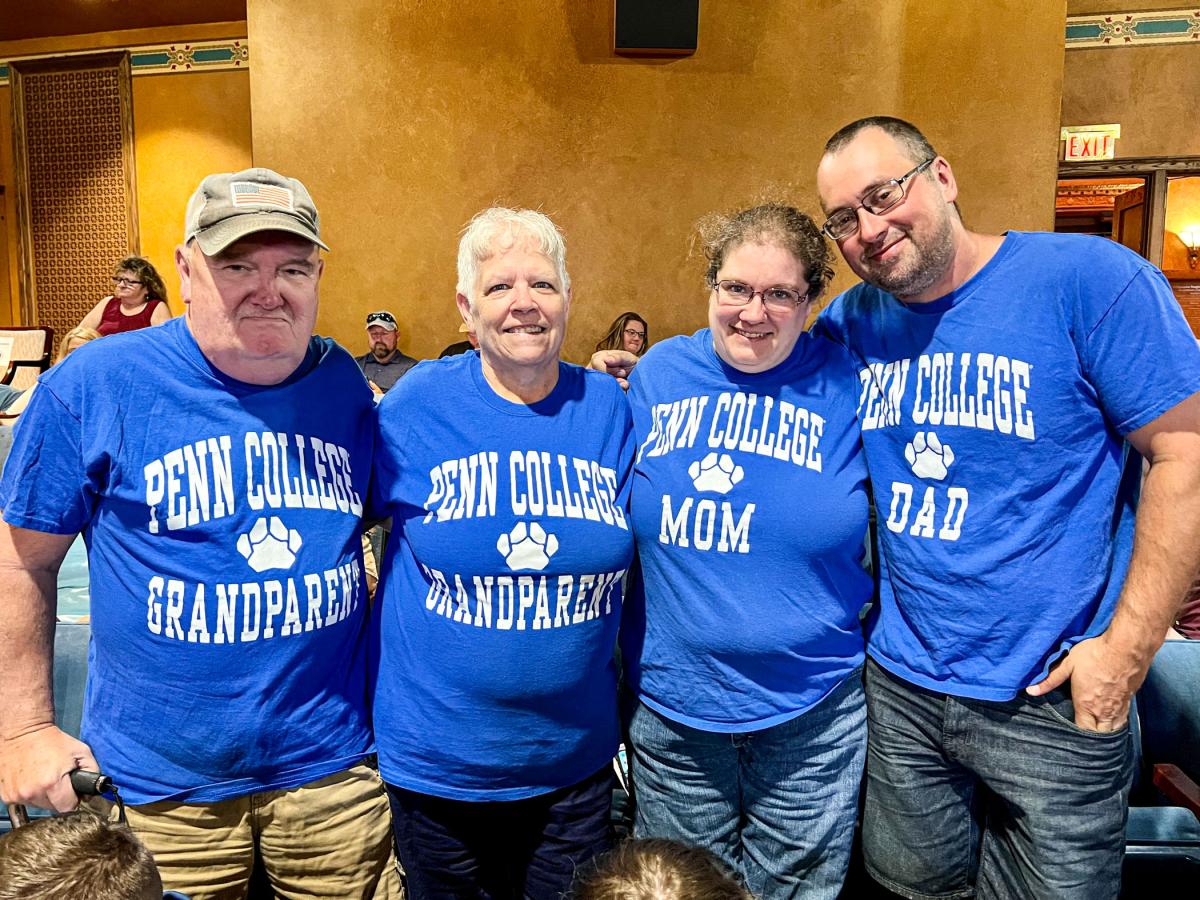 Fab four! The family of Jacob Benjamin Keir, landscape/plant production technology, shows its Penn College pride "to a T."
