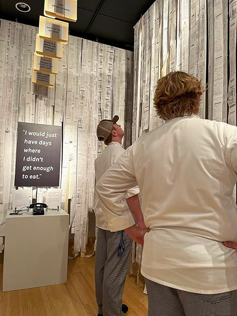 Students view “Transaction Denied,” a 2019 work by Xena Ni & Mollie Ruskin.