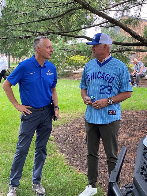 President Reed talks with former Philadelphia Phillie and Chicago Cub Ryne Sandberg shortly after the Hall of Famer (and parade grand marshal) arrived at Penn College. (Photo by Joseph S. Yoder, associate vice president for public relations and marketing)