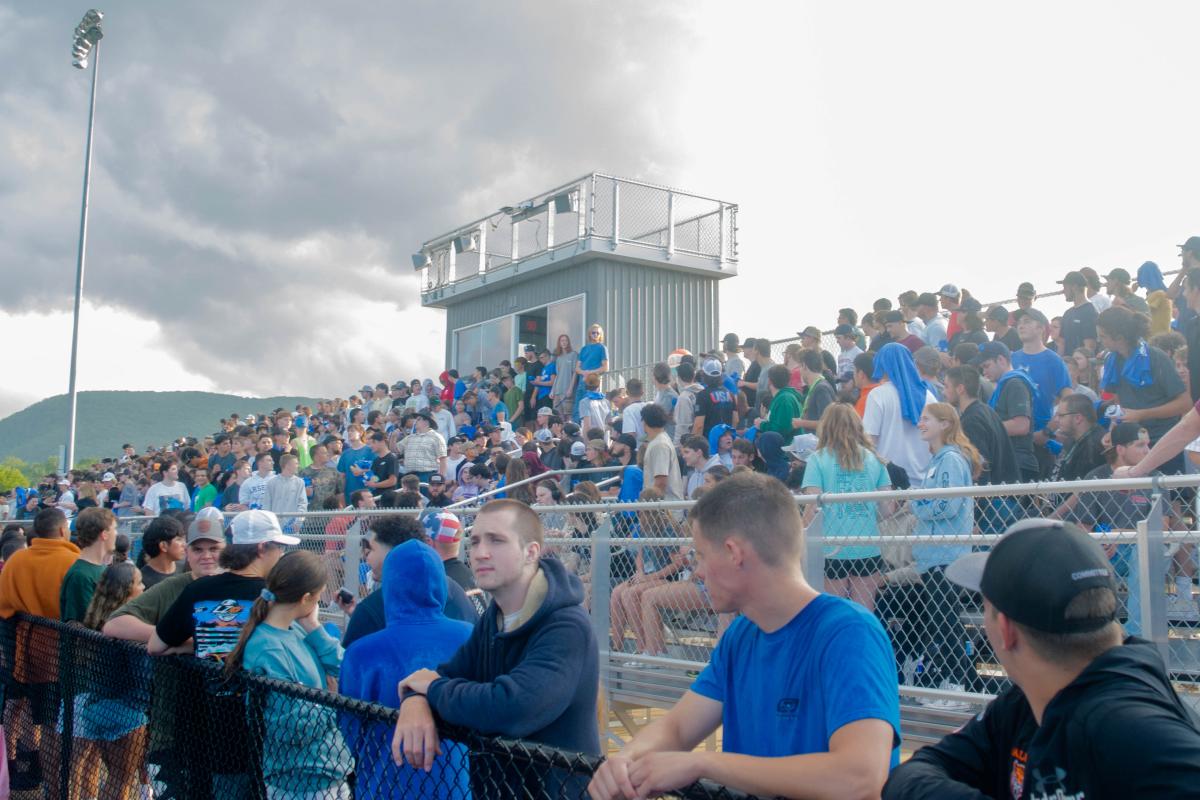 ... and lining the UPMC Field fence for Thursday's somewhat soggy festivities
