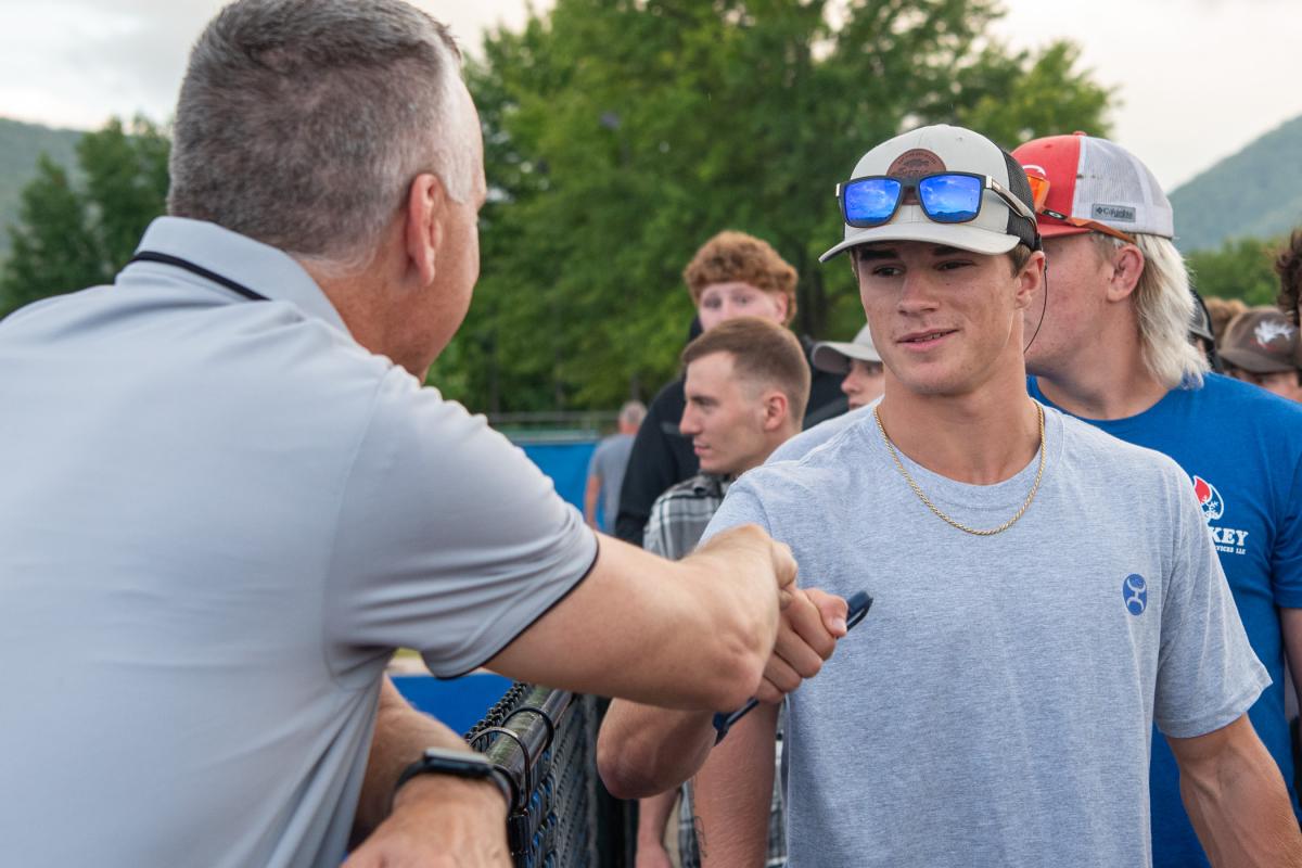 From his along-the-fence vantage, the president greets every new incoming student ...