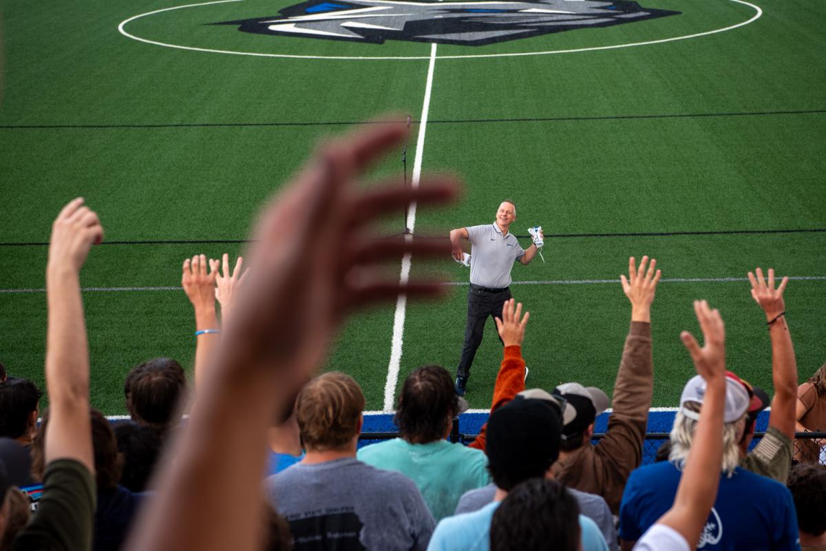 At home in any sports venue, Reed prepares to toss some T-shirts. 