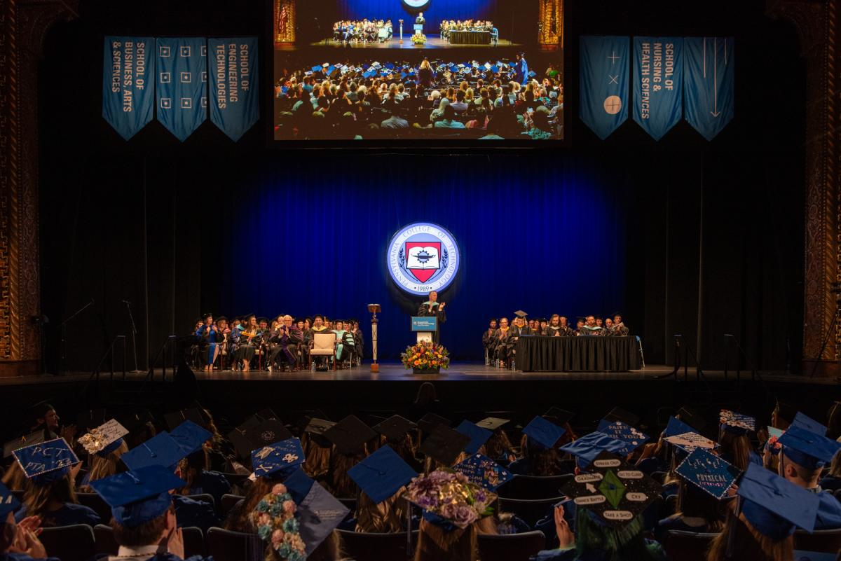 Following the presentation of diplomas, the president calls for another round of applause for the Summer 2023 graduates. 