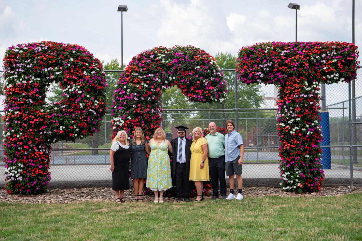 The family of Jacob M. Klokis, a new graduate in heating, ventilation & air conditioning technology, savors the celebration. 