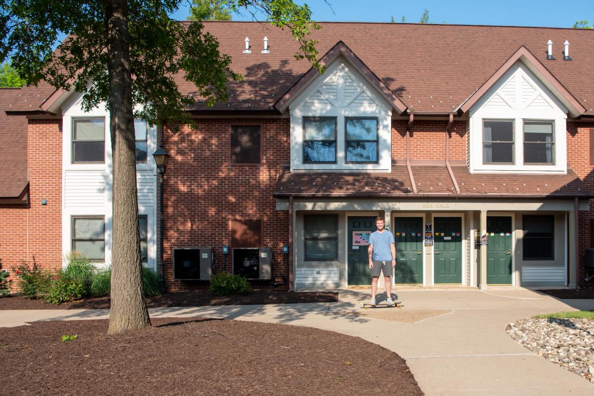 Corbin John Drigalla glides through The Village. A second-semester student in mechatronics from Skillman, N.J., Drigalla also works as part-time waitstaff at Le Jeune Chef Restaurant. 