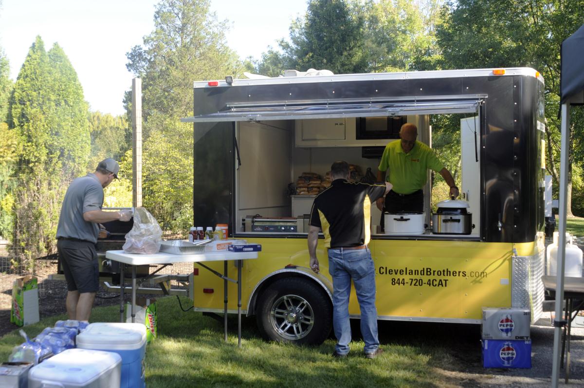 The Cleveland Brothers team includes a Chuck Wagon, where preparation started early to cook burgers and dogs for an endlessly hungry clientele.