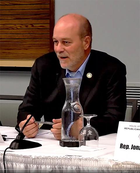 Flick opens the morning hearing, alluding to its placement between two events that feature aspects of human services: the stress felt by players in the Little League Baseball World Series as eyes across the globe watch them; and the 9/11 Memorial Ride, an emotional tribute that includes a number of veterans.