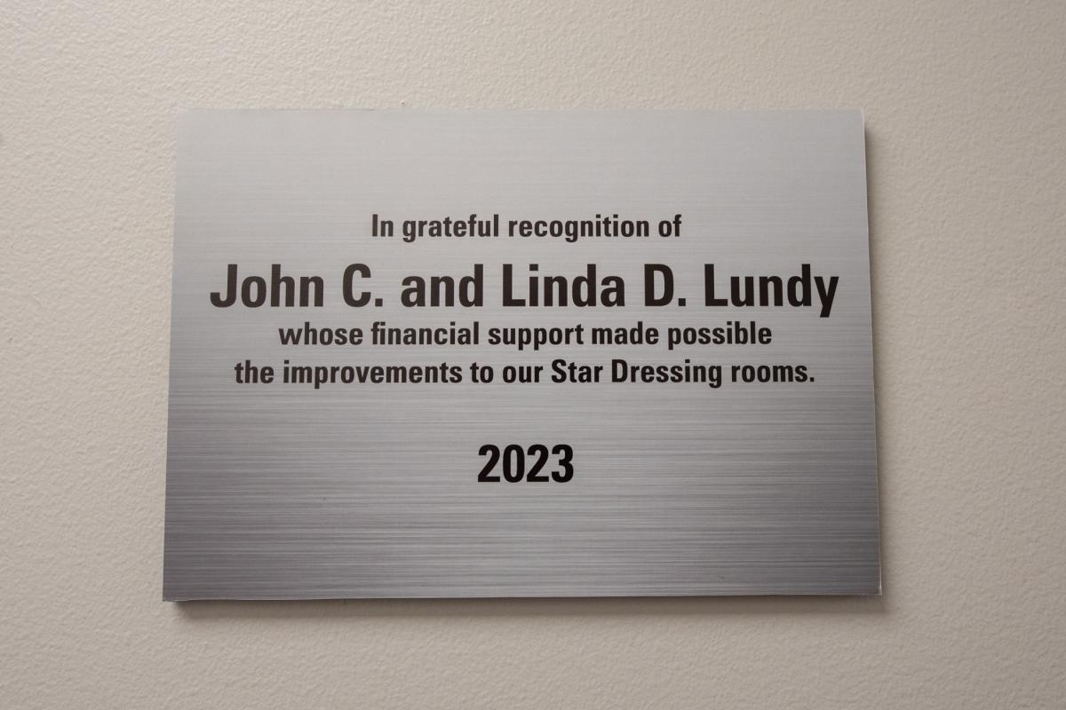 The Lundys' philanthropy is reflected in a commemorative wall plaque.