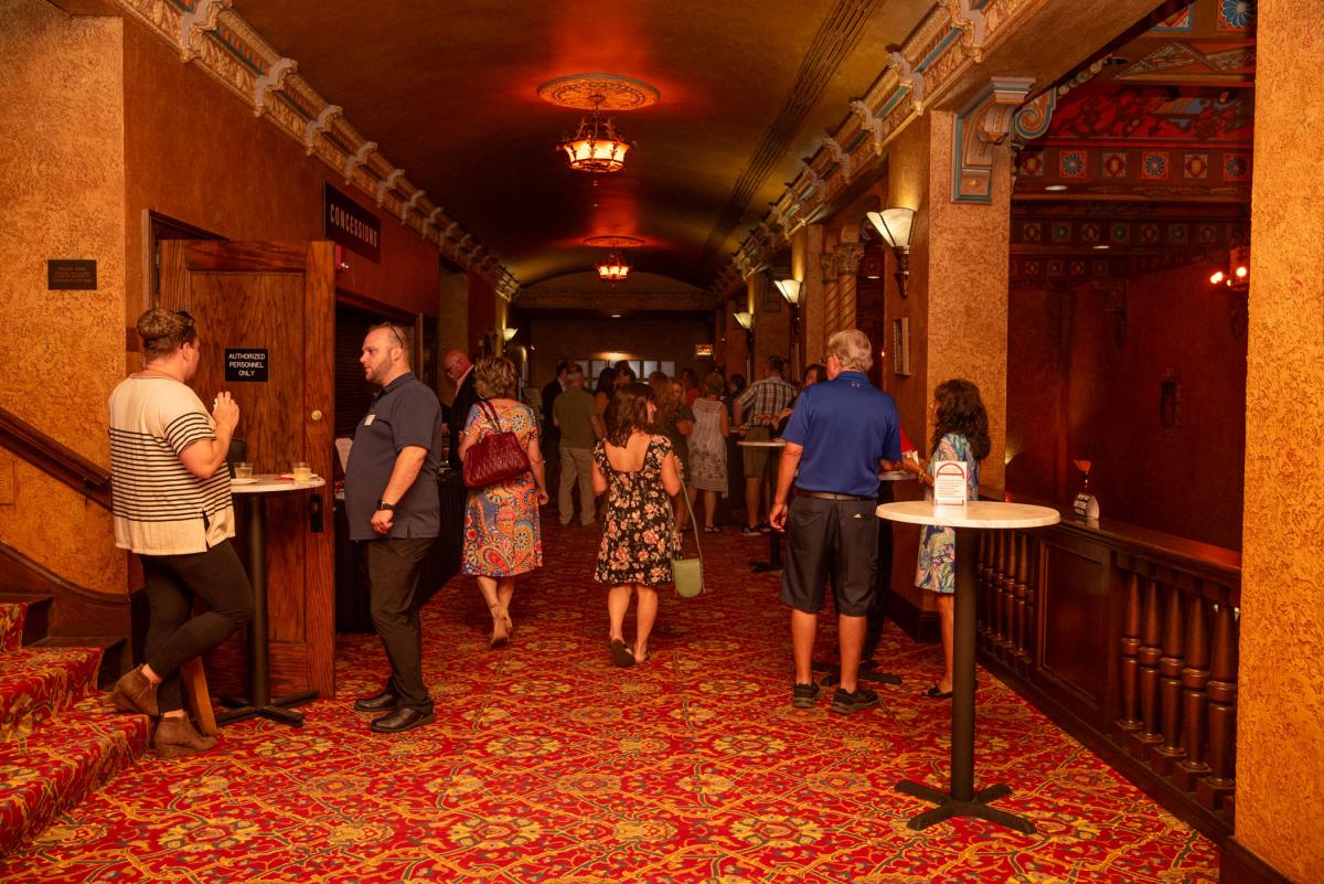 PM Exchange guests savor hors d’oeuvres on the arts center’s second-floor mezzanine (among the venue’s numerous gathering spaces) …