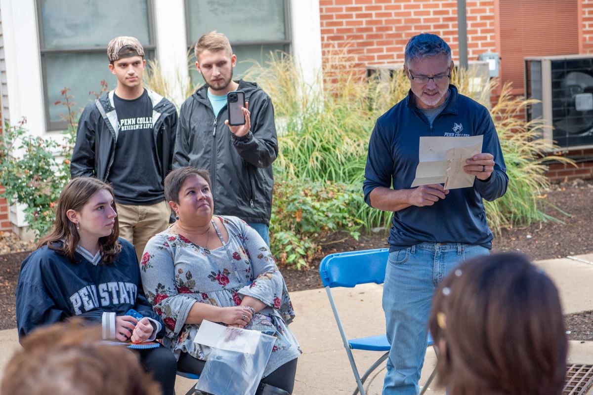 Mallery and Hood read letters written in 1998 by then Interim President Davie Jane Gilmour and Dean of Student Services James E. Fitzpatrick. Gilmour's letter to the "Village Residents of the Twenty-First Century," for instance, recounted the inspiration to build a suitable living and learning environment on campus. "We wanted students to feel comfortable and safe, and to have computer access to campus resources, a novel idea at the time but, I'm sure, quite ordinary as you read this," she wrote.