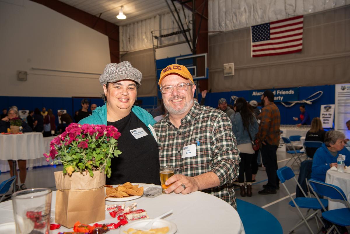 Alison Rhoads ’14, early childhood education, enjoys a night out with her husband, Jeff, who is sporting a Williamsport Area Community College hat just because he “likes the colors." WACC is a predecessor of Penn College. 