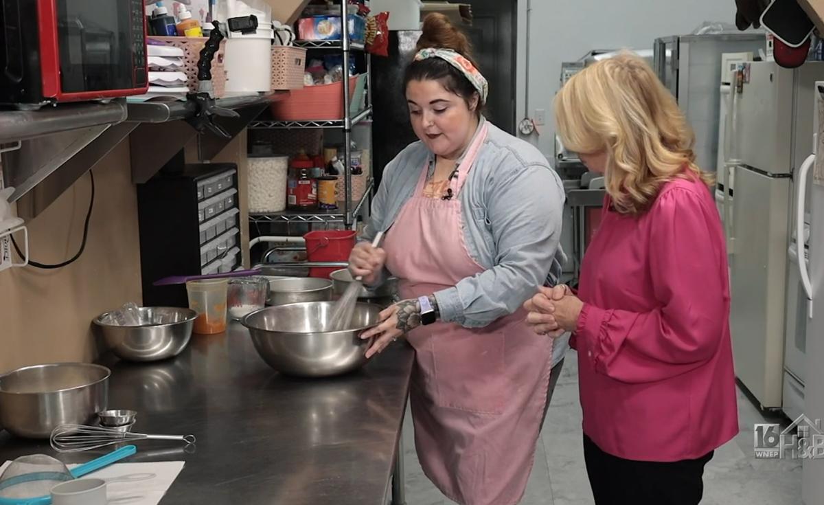 Sabrina (Strassner) Branning, a 2012 Penn College graduate, welcomes "Home & Backyard" co-host into the kitchen of her Milton bakery.
