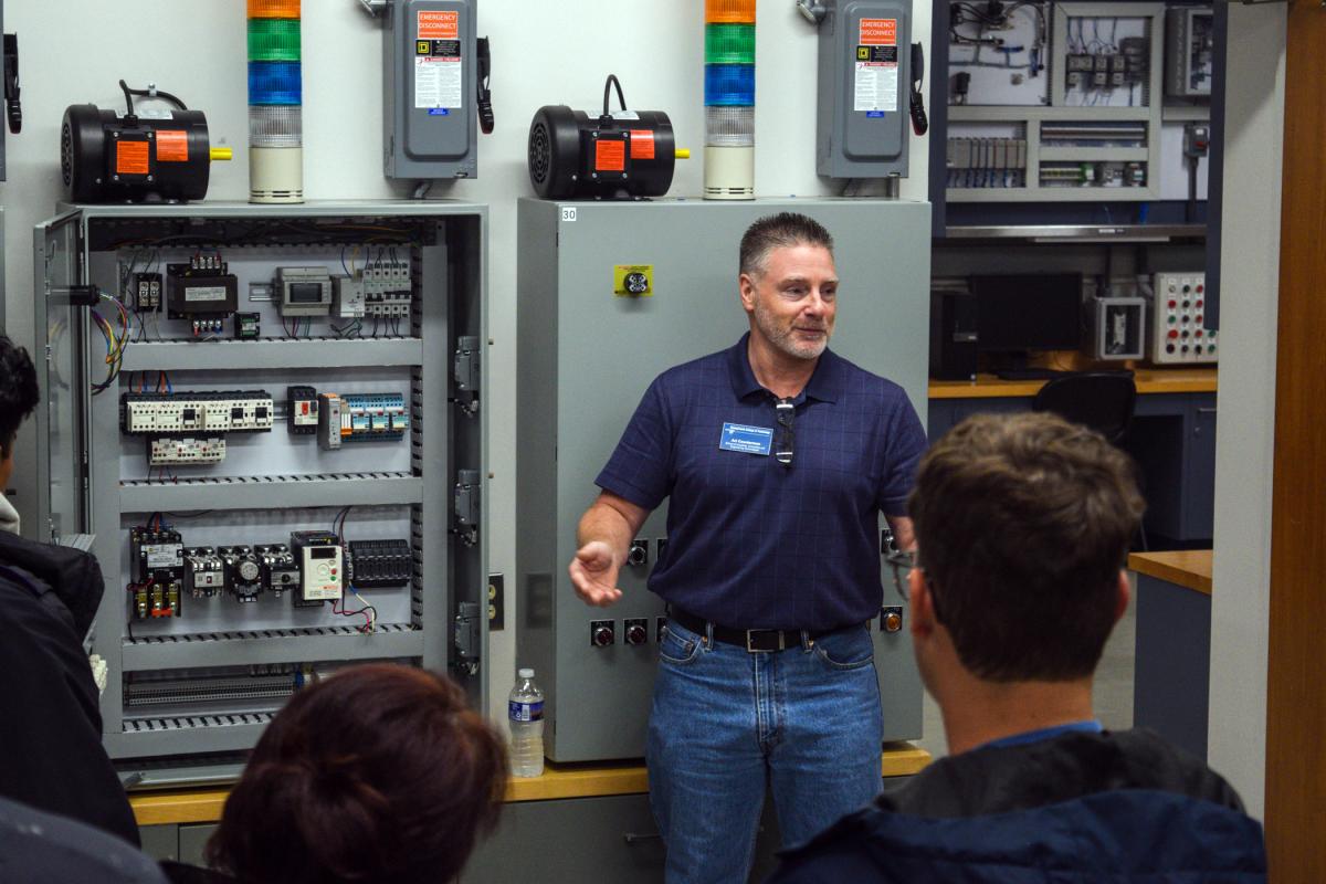 Industry-grade lab equipment and experienced faculty make campus tours a popular draw, like this one with Art L. Counterman, instructor of electrical technology/occupations.