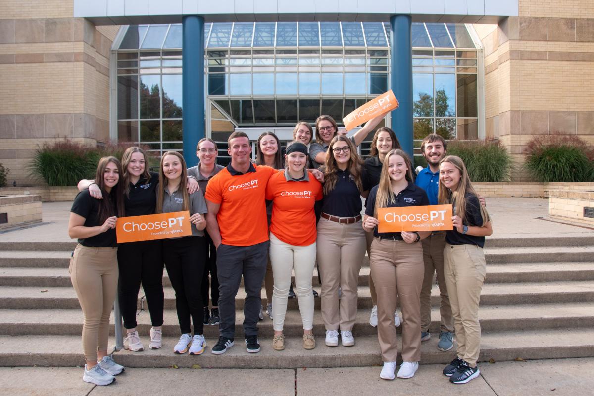 Physical therapist assistant students gather outside the Breuder Advanced Technology & Health Sciences Center to encourage the public to “Choose PT” to help address and avoid movement problems and live a fulfilling, healthy and independent life.