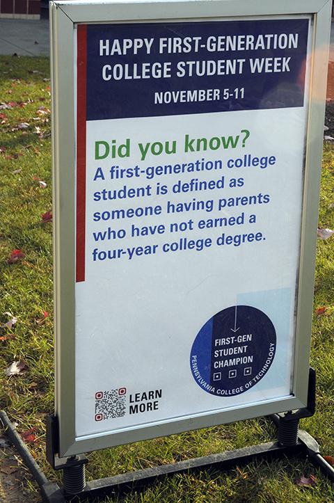 Who's a first-generation student? Portable campus signage provided a definition (and much more information throughout the week).