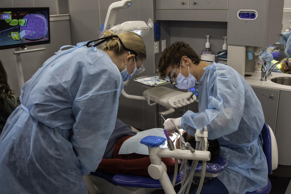 Students Olivia M. Chaapel, of Columbia Cross Roads, and Mikey E. Strohm III, of Thompsontown, provide prophylaxis.