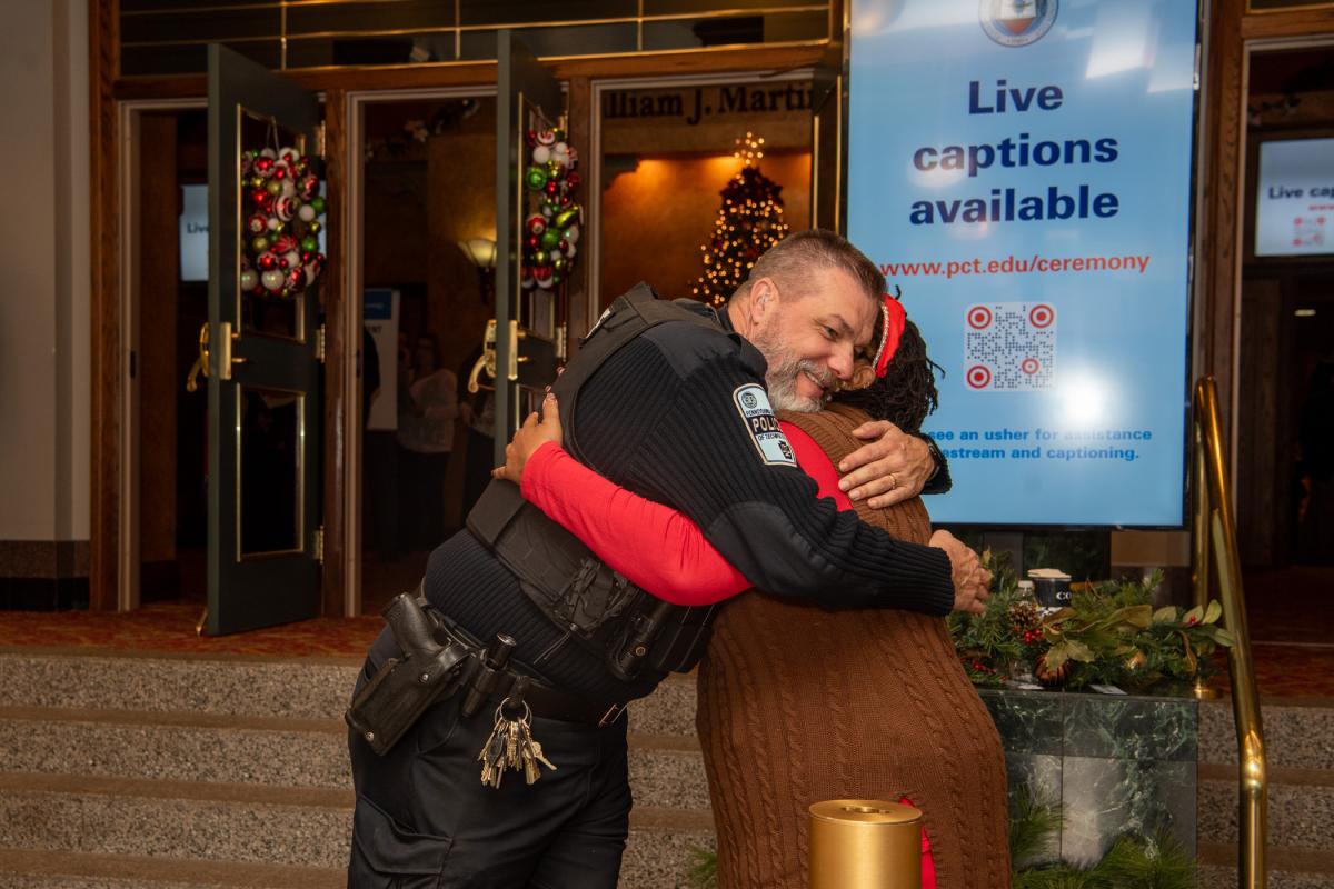 ... who also shares warm greetings with fellow employees like Penn College Police Officer Jeffrey E. Kriner.