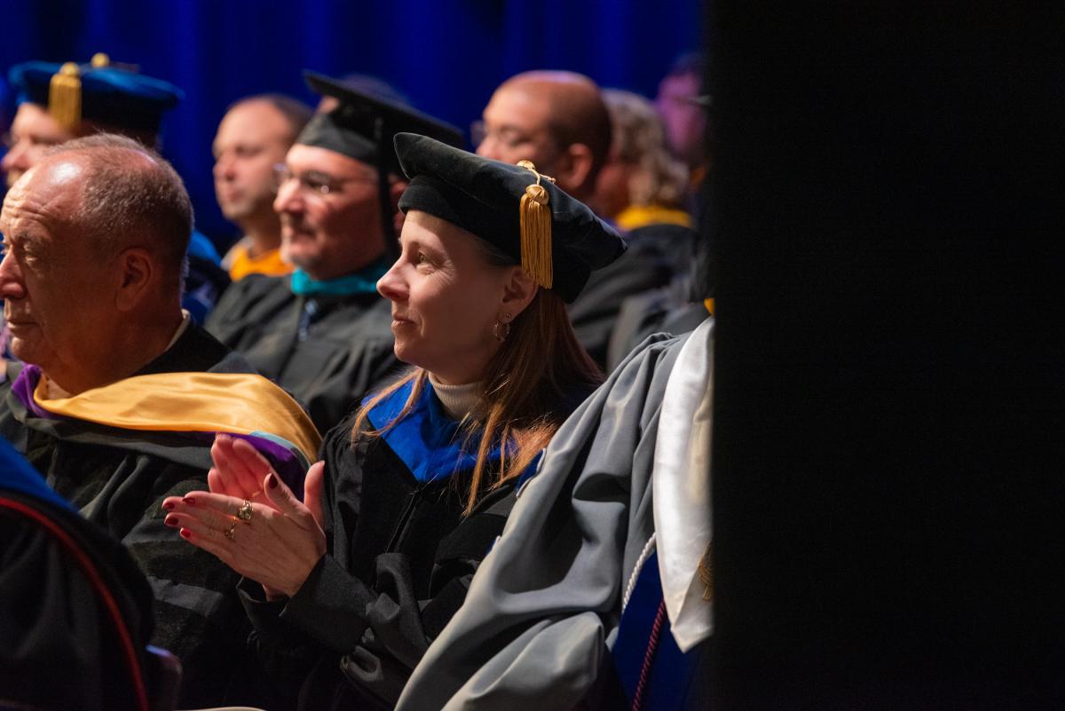 Among the faculty applauding graduates as they cross the stage is Tammy M. Rich, associate professor of business administration/management/event management. Rich is among the campus mentors who received a special shoutout in the student speaker’s speech.